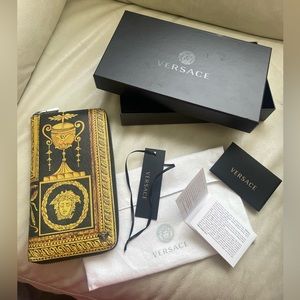 Authentic Versace Tribute pouch with tags,original box and dust bag